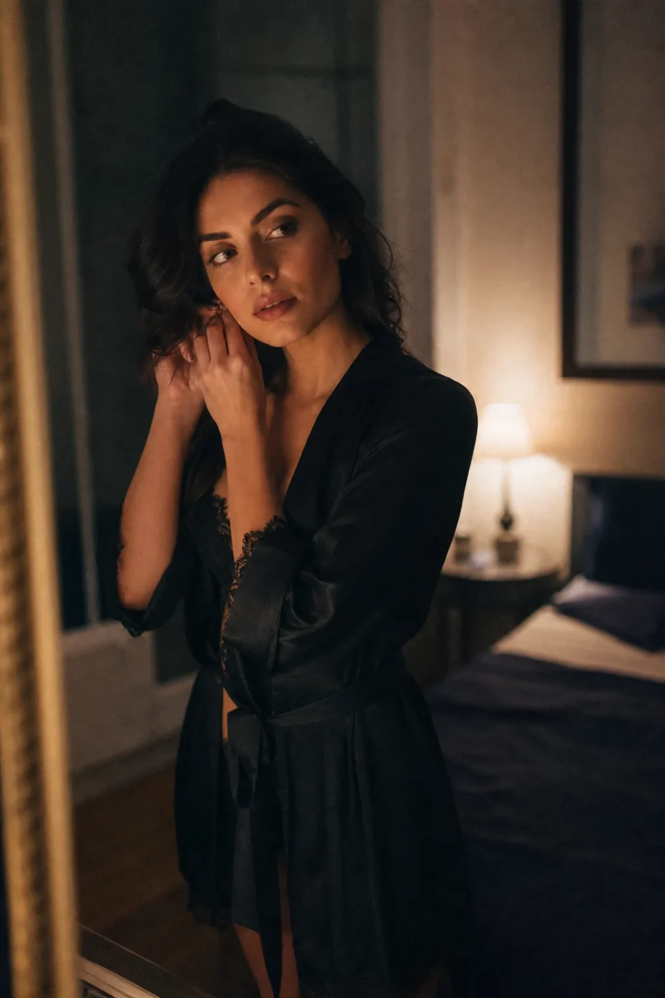 Woman in moody bedroom
